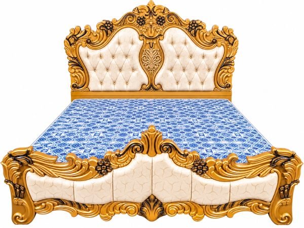 Intricately carved wooden bed