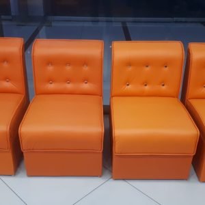 Elegant set of four bright orange upholstered lounge chairs ( per piece )